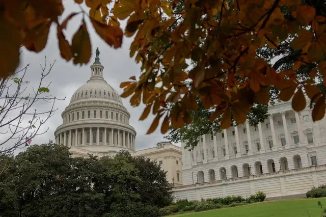 FILE PHOTO: Fall foliage frames the US Capitol building on a cloudy day on Capitol Hill in Washington, D.C., US, September 28, 2026. REUTERS/Kylie Cooper/File Photo